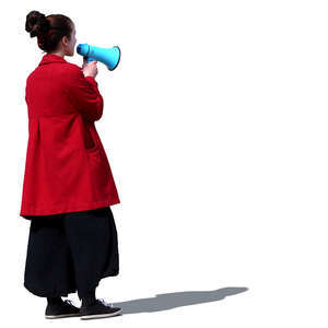 woman standing and talking into a megaphone