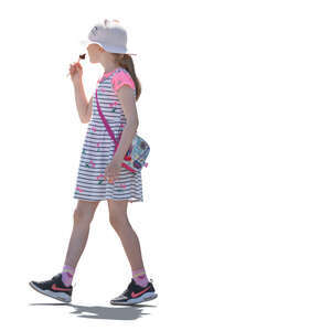 backlit girl walking and eating candy