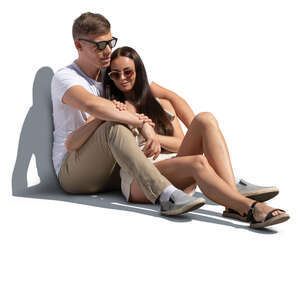 cut out man and woman sitting and holding each other