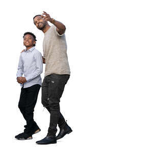 cut out black man and his son walking and looking up