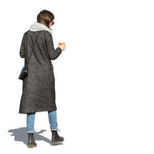 cut out woman in an overcoat walking and drinking coffee