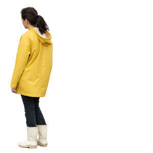 cut out woman in a yellow raincoat standing