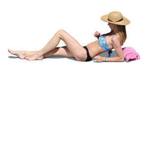 cut out woman lying on the beach and sunbathing