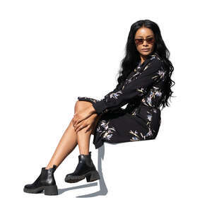 cut out young black woman sitting