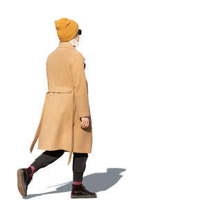 cut out woman in a brown overcoat walking