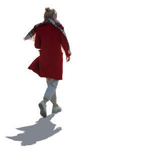 cut out backlit woman wearing an overcoat walking