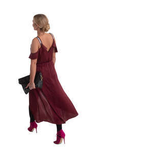 cut out woman in a red dress walking seen from above