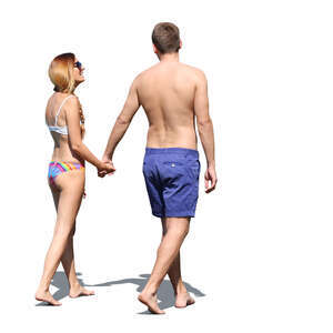 cut out couple at a beach walking hand in hand