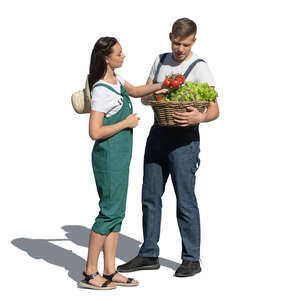 cut out man and woman with a vegetable basket standing in the garden