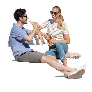 two cut out young women sitting on garden chairs and drinking - VIShopper