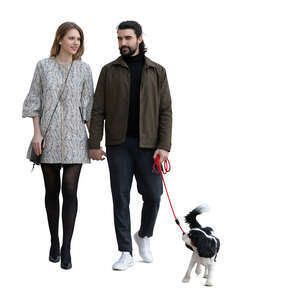 cut out couple with a dog walking hand in hand