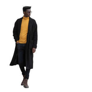 cut out black man in a long brown overcoat walking