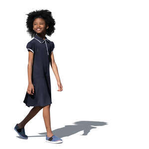 cut out little smiling black girl in a blue summer dress walking