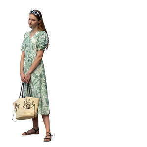 cut out woman in a green summer dress standing