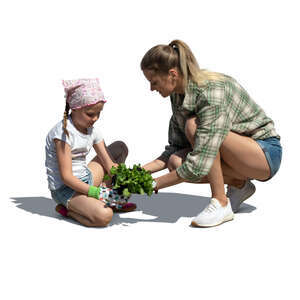 cut out mother and daughter planting in the garden