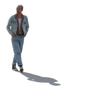 cut out backlit man walking hands in pocket