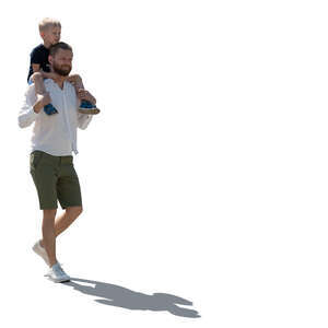 cut out backlit man walking and carrying his son on his shoulders