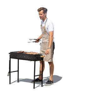 cut out man grilling meat on an outdoor barbeque stove