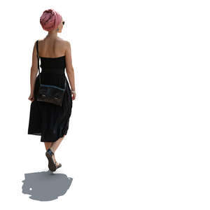 cut out woman in a black summer dress wearing headscarf walking