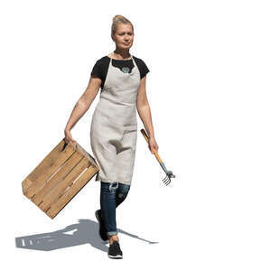 cut out woman carrying a wooden crate