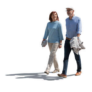 cut out elderly backlit couple walking
