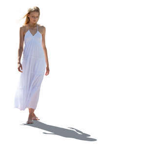 cut out backlit woman in a white dress walking barefoot