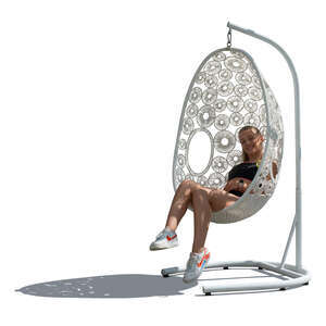 cut out teenage girl sitting in a white hanging chair