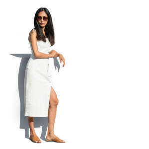 cut out asian woman in a white dress standing and leaning on a railing