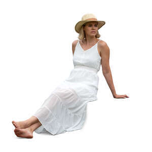 cut out woman in a white dress sitting on a terrace