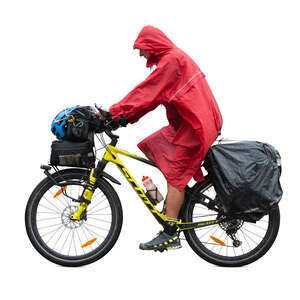 cut out man with a raincoat and hiking bags riding a bicycle