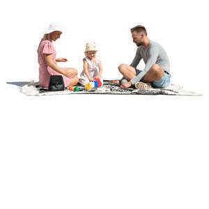 cut out family playing outside on the picnic blanket