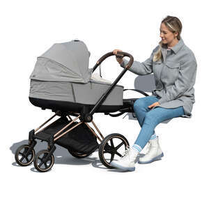 cut out woman sitting and rocking a baby carriage