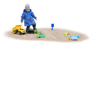 cut out little boy playing in the sand box