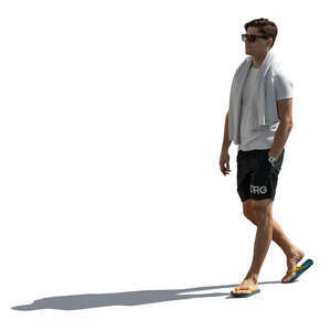 cut out backlit man walking in resort