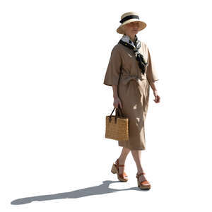 cut out elderly lady in a beige dress walking