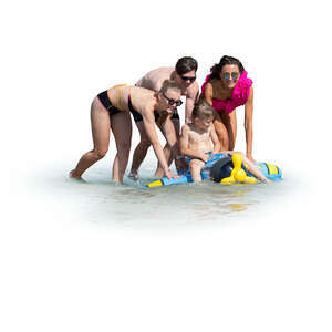 cut out family having fun on the beach