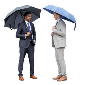 two cut out businessmen with umbrellas standing and talking