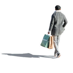 cut out man in a grey overcoat and carrying shopping bags walking 