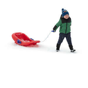 cut out little boy with a sledge walking