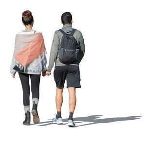 two cut out people walking hand in hand