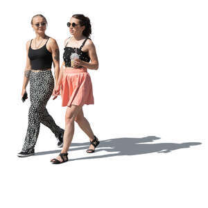 two cut out young women walking