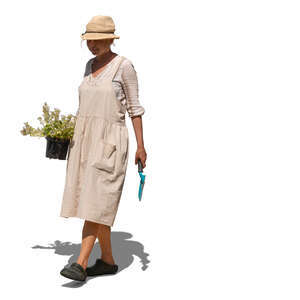 cut out female gardener going to plant some flowers