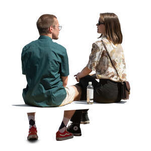 cut out man and woman sitting seen from back angle