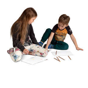 two cut out kids sitting on the floor and drawing