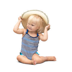 cut out little girl in a swimsuit sitting and laying with a hat