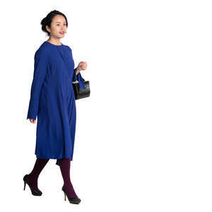 cut out asian woman in a blue dress walking