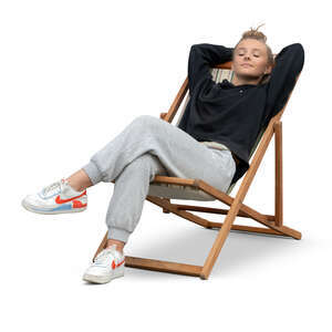 cut out teenage girl relaxing in the garden chair