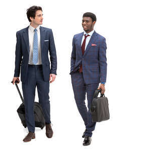 two travelling businessmen walking