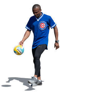 black man juggling a soccer ball