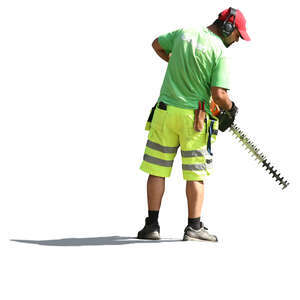 man working with a hedge trimmer